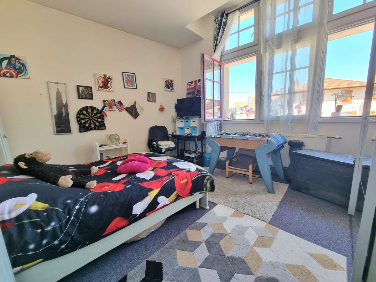 Appartement 3 pièces 90 m2 1er étage avec jardin et cave